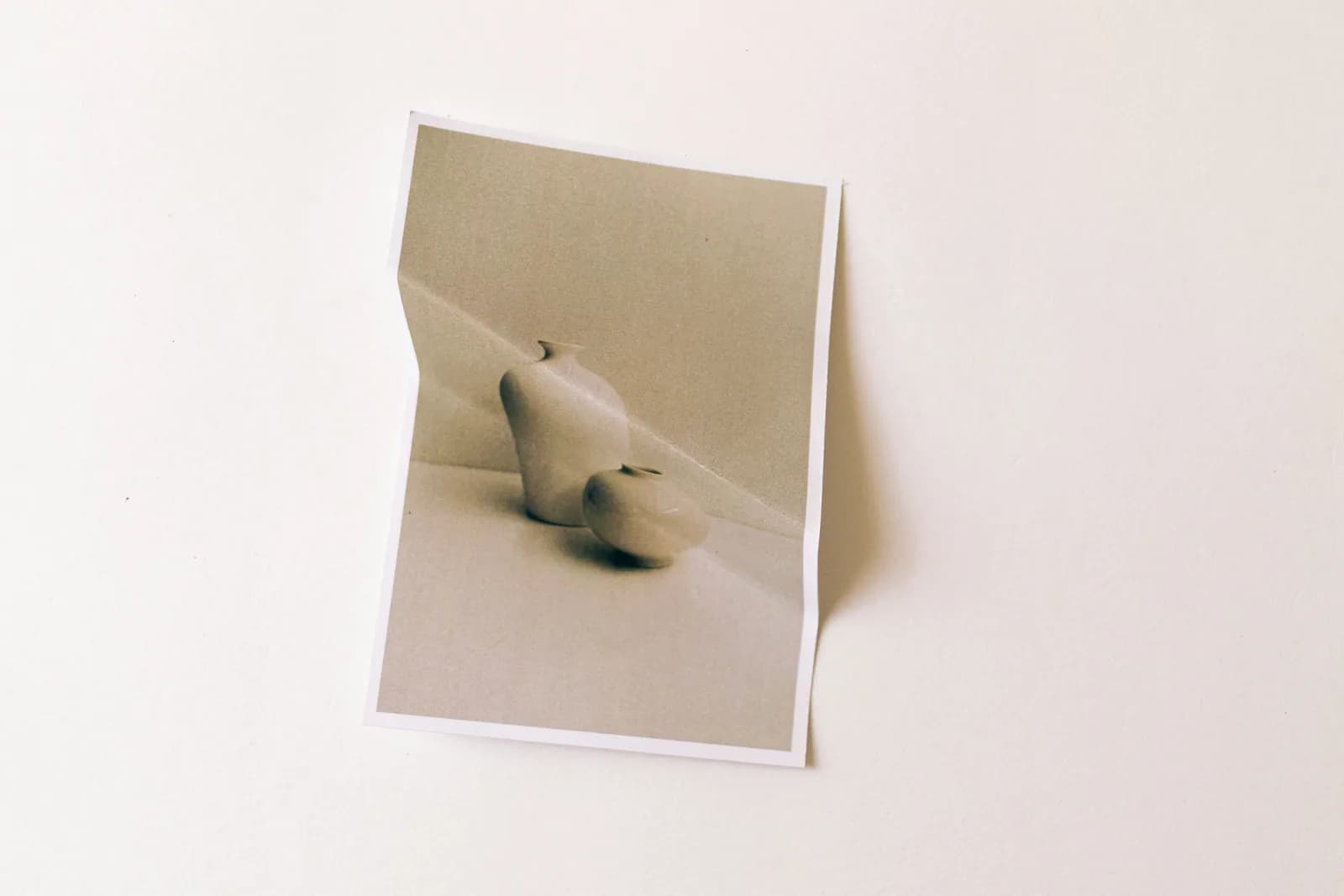 A small sculptural object photographed in soft daylight