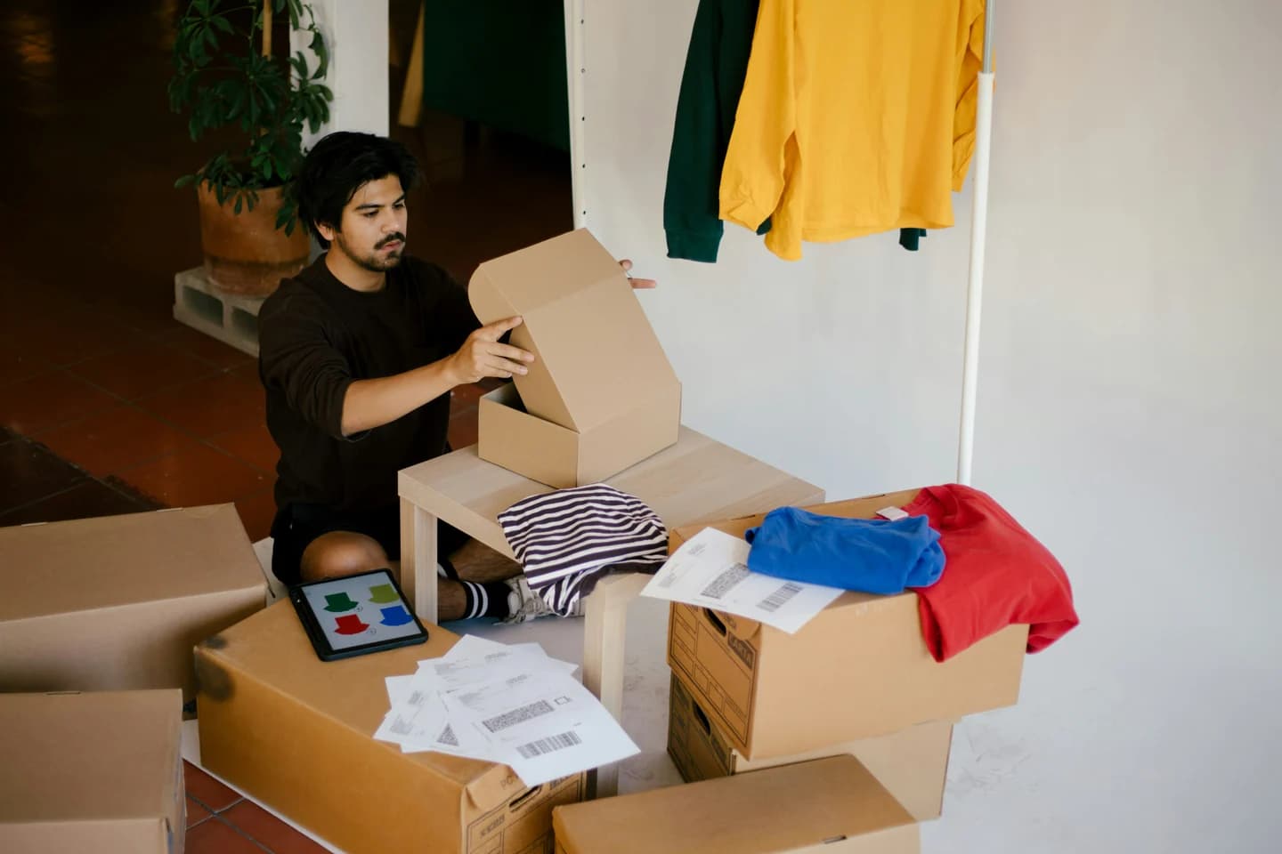 Craft studio workbench with packaged shipments ready for collection